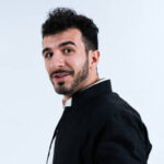 Aram Shkur in a black jacket