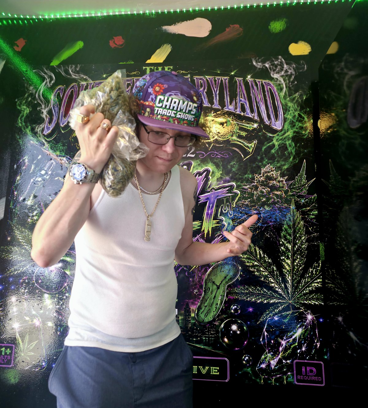 Stevieontay Burnz in front of a Southern Maryland Experience display